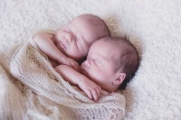 Twins cuddling